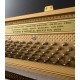 Foto de las clavijas del Piano Vertical Petrof P122 N2