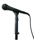 Photo closeup of the microphone Shure PGA 58 BTS in the stand with the clamp and cable