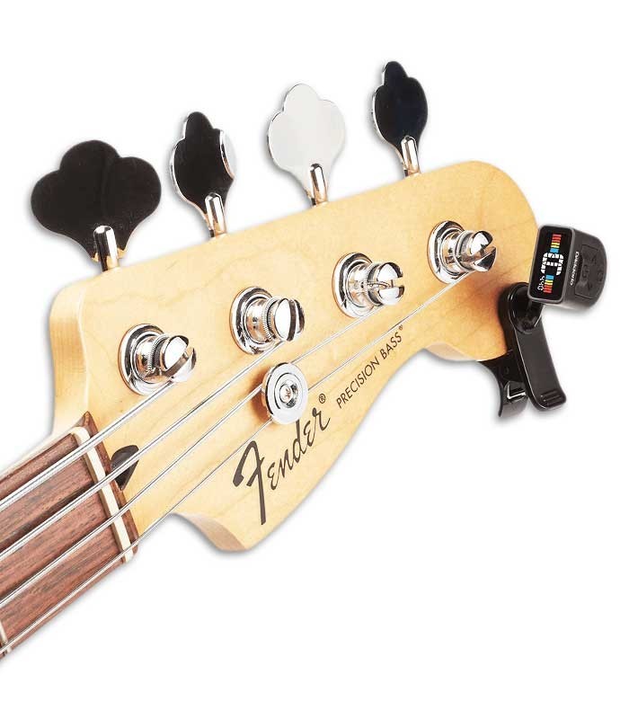Photo of the Tuner Daddário PW CT 13 Micro Clip Tuner on the head of a bass guitar