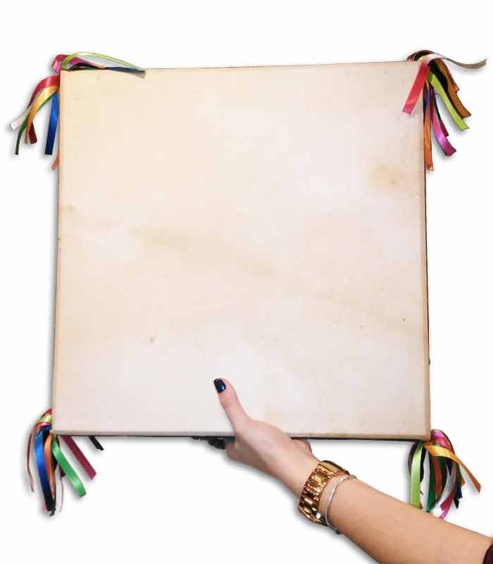 Photo of adufe MMG of 40cm held in a hand