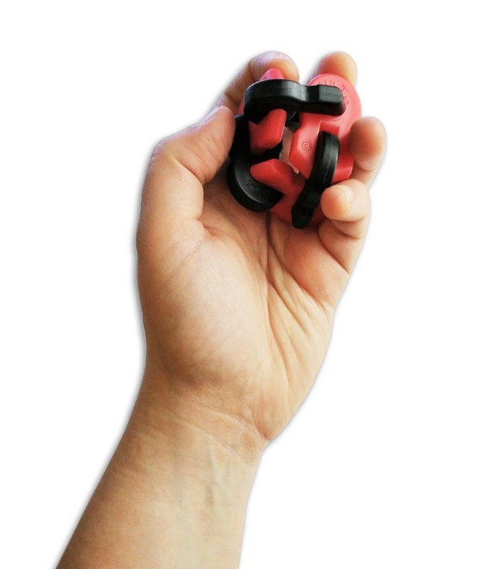 Foto do Exercitador DAddario Fiddilink PW FDLK numa mão