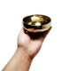 Tibetan singing bowl Gewa model 300G on a hand