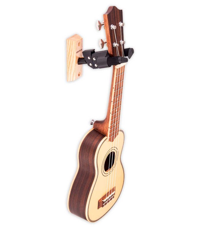 Wall stand Hercules model USP10WB holding an ukulele