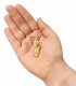Pin Ortolá model FTP005 Saxophone in golden color on the palm of a hand