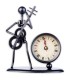 Clock Artcarmo model 980712 Bass Player statuette with roman numerals