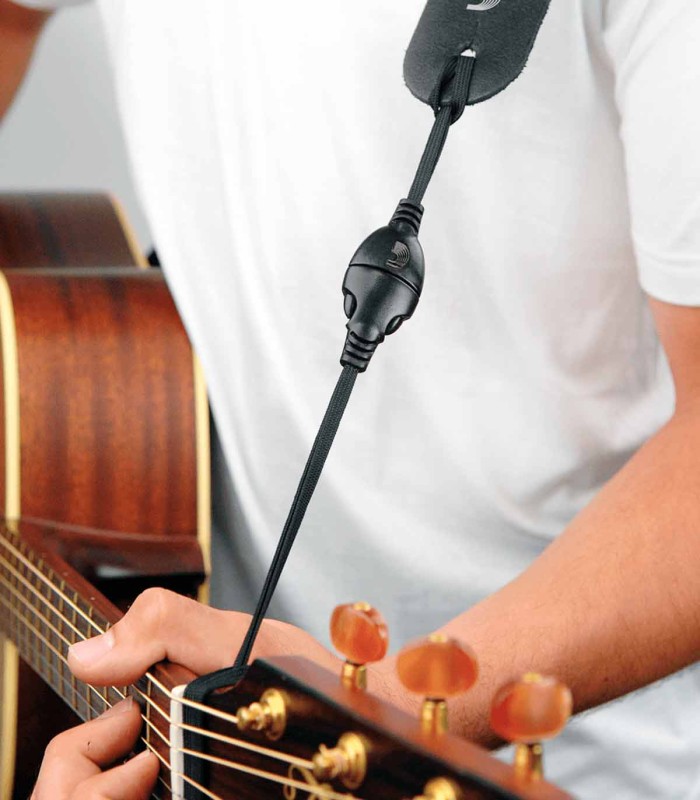 Guitar strap DAddario model DGS15 adapter used with an acoustic guitar strap