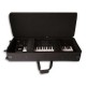 Photo of case Gator GK88 SLXL open and with a piano