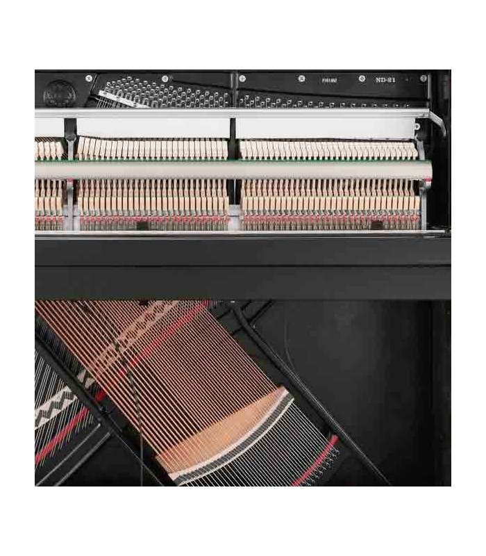 O piano vertical Kawai ND 21 apresenta um mecanismo de ultra-resposta e ataque direto