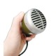 Foto del micrófono Shure SH 520DX para armónica en la mano